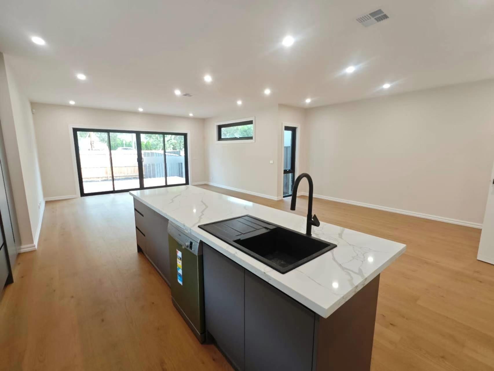 Open-plan kitchen renovation with island bench